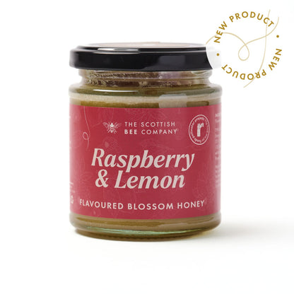 Jar of raspberry and lemon honey from The Scottish Bee Company on a white background