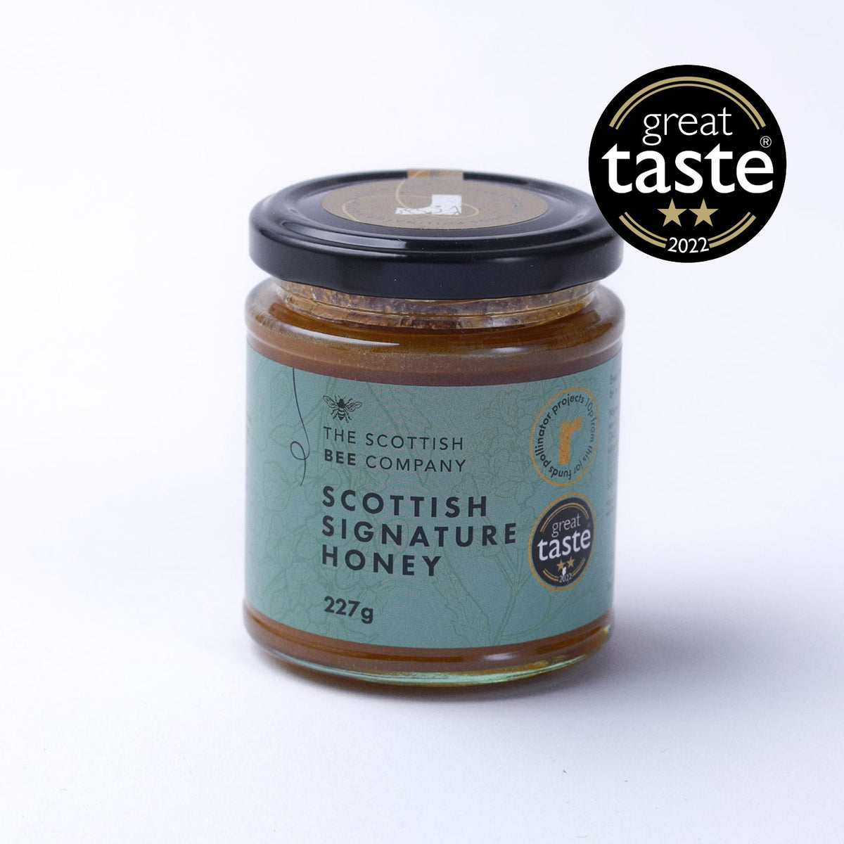 Jar of Scottish Signature Honey from The Scottish Bee Company with Great Taste award on a white background